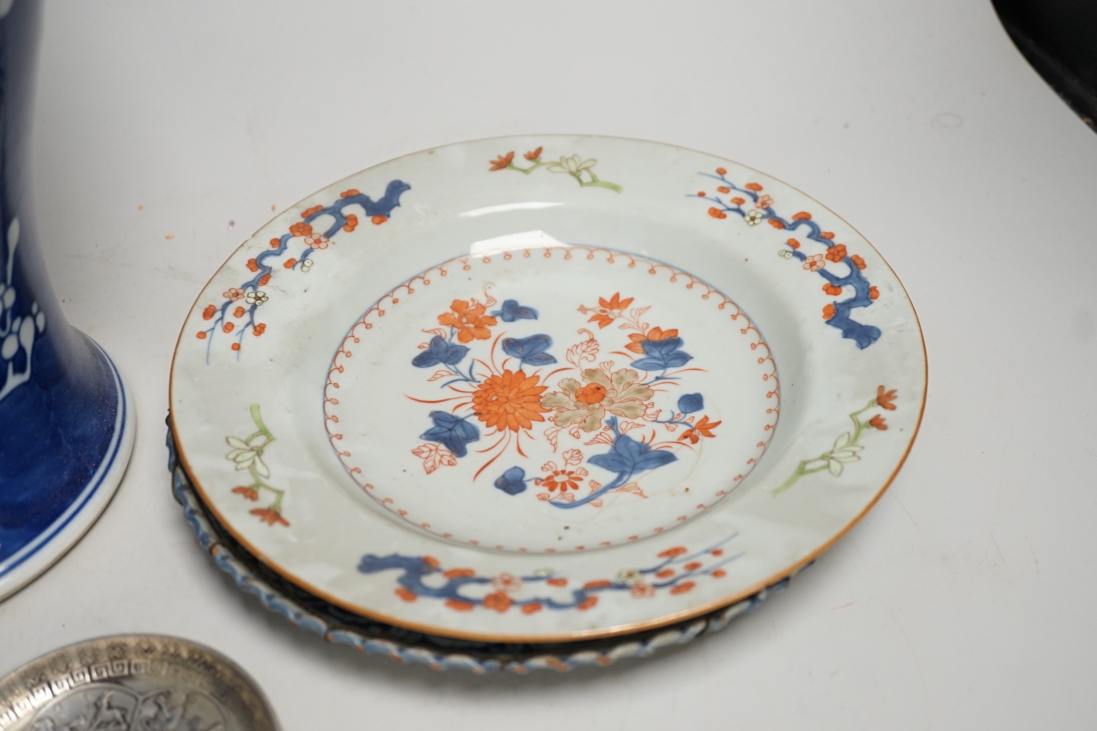 A large Chinese blue and white prunus vase, 46.5cm, together with Chinese export plates and oriental ceramics etc